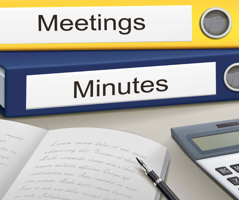 picture of two notebooks that say meetings and minutes